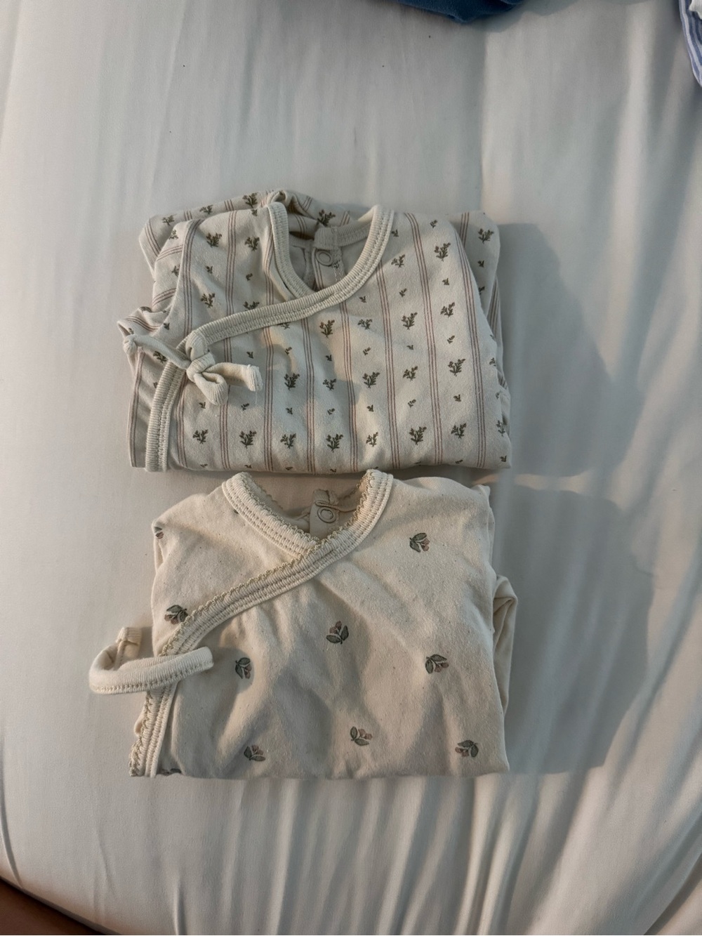 Neutral Cream Baby Footie One-Piece with Subtle Floral Print